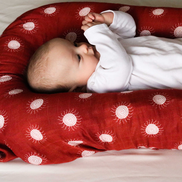 Sun on Terra Cotta Baby Muslin Swaddle